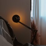 Photo Matte black cylindrical floor lamp for bedroom bedside